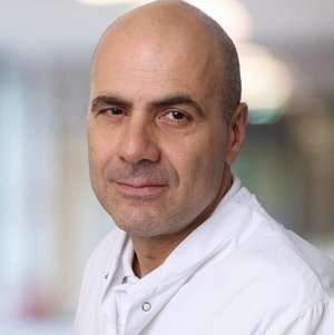 دكتور. ميد. ألكسندر أولك, [object Object]