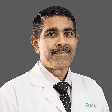 Dr. ሻንካር አይያፓን ኩቲ, [object Object]